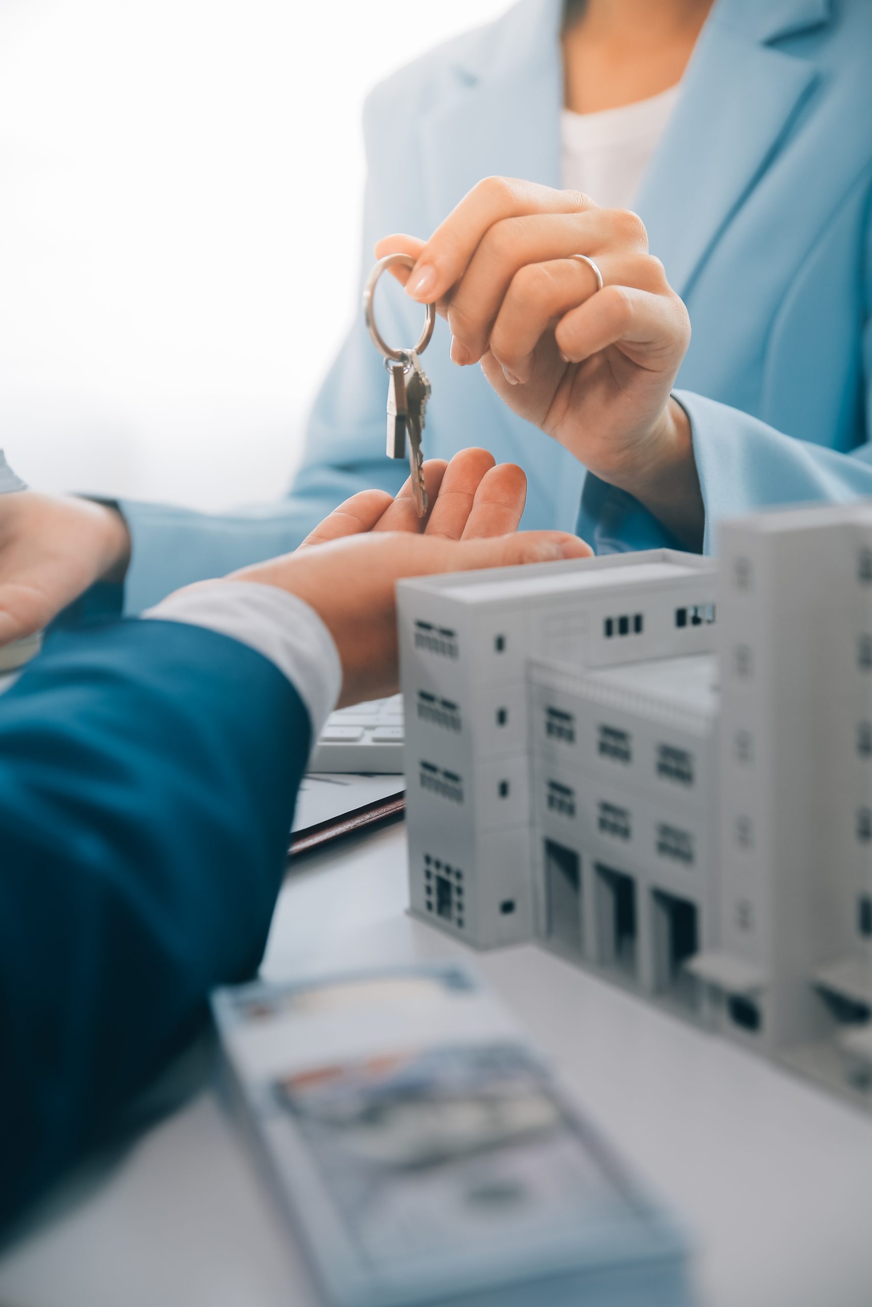 Real estate agent talked about the terms of the home purchase agreement and asked the customer to sign the documents to make the contract legally, Home sales and home insurance concept.